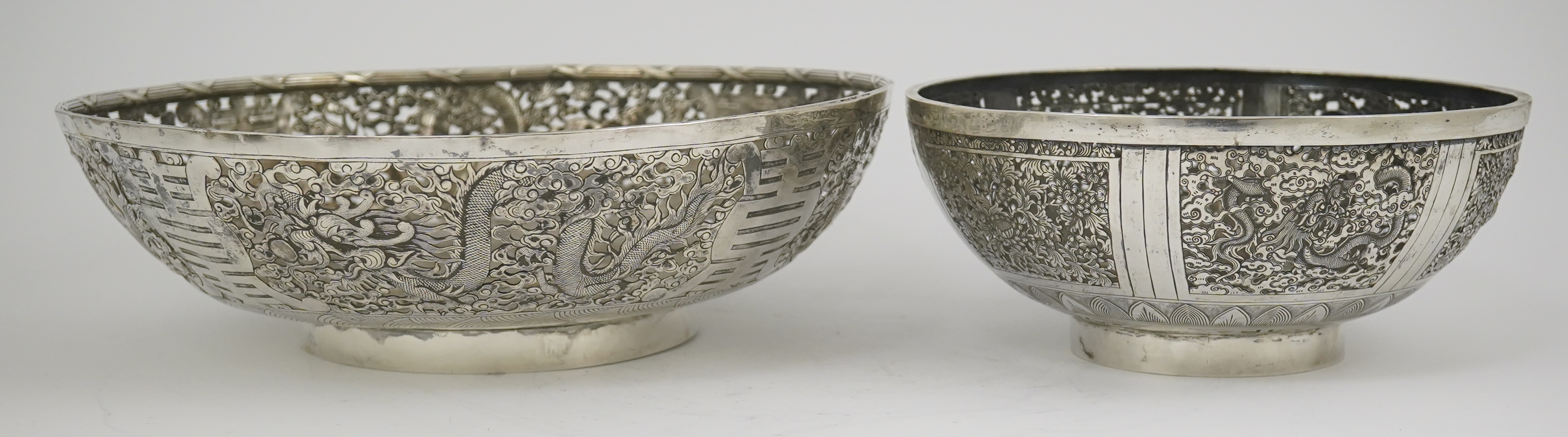 Two early 20th century Chinese Export pierced silver circular bowls